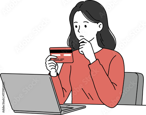 Young woman contemplating online payment while sitting at laptop 