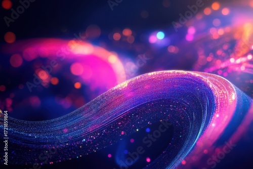 Swirling abstract light trails and bokeh in vibrant pink purple and blue background