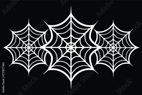White spider webs on a black background create a striking visual pattern for Halloween decoration