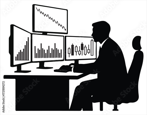 Silhouette of a trader at multiple computer monitors displaying charts stock market finance