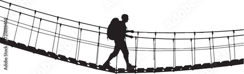 Silhouette of Hiker Crossing Suspension Bridge