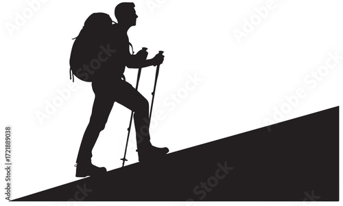 Silhouette of Hiker Ascending a Slope with Trekking Poles