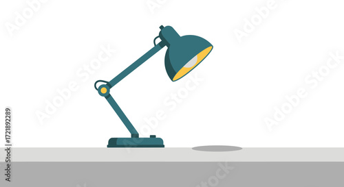 Articulated office table lamp switched on, casting light onto a workspace. A metaphor for learning, innovation, and bright ideas