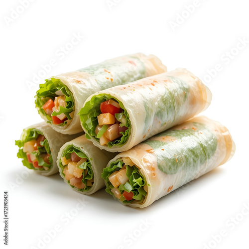 Fresh vegetable spring rolls isolated on a white background, showcasing crisp rice paper filled with vibrant.