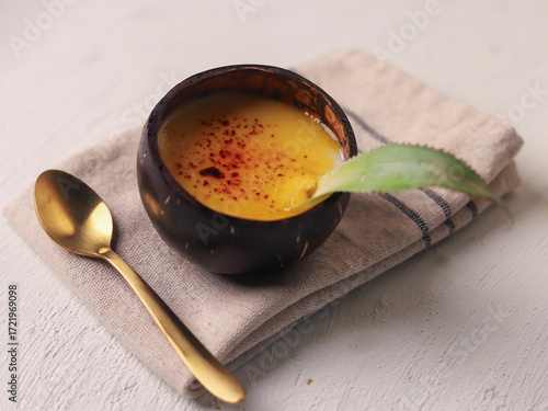 Caramelized Pineapple Dessert in Coconut Shell Bowl