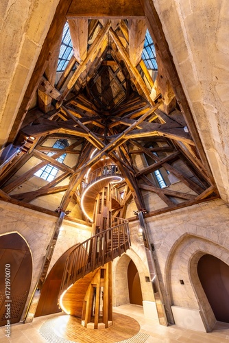 Paris, France - September 20, 2025: A new wooden staircase now rises inside the South Tower of Notre-Dame Cathedral. Rebuilt in solid oak after the 2019 fire
