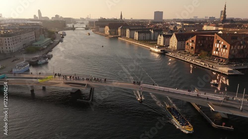 Aerial View Denmark capital city, Amazing historical city center. entertainment district in Copenhagen. The canal harbours many historical wooden ships. Aerial view from the top. Panorama view
