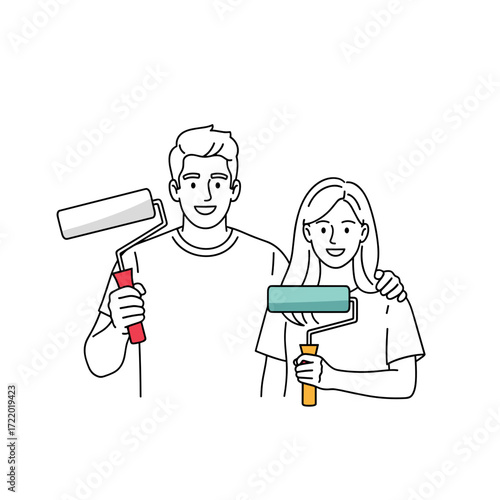Smiling couple with paint rollers ready for a project