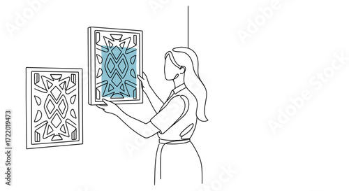 Woman installing decorative panels 
