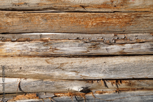 Rustic weathered wood logs texture background