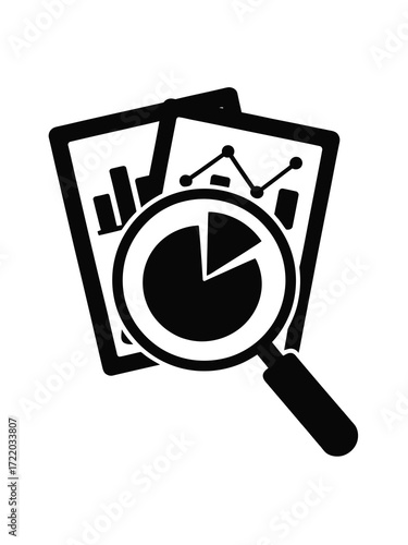 Magnifying glass over financial charts and graphs for analysis