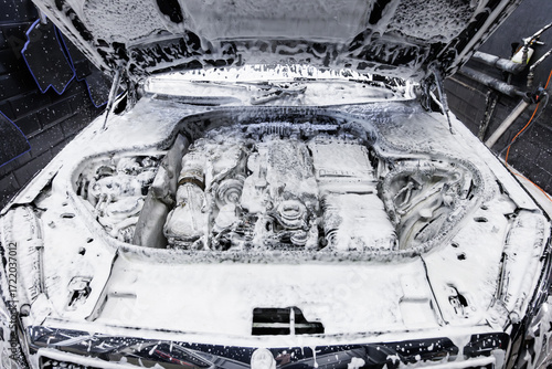 The process of applying foam for an engine bay wash A comprehensive car detailing approach
