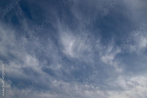 Blue Sky With Wispy Clouds Over a Calm Day, Open Air, Peaceful Sky Scene