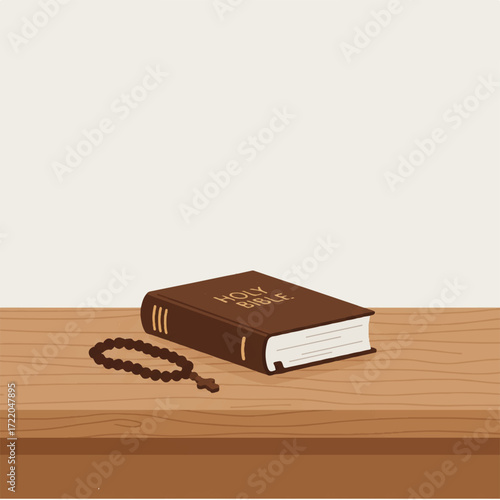 A brown Bible and rosary rest on a wooden surface