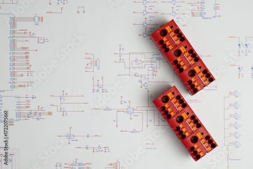Red electrical connectors on circuit diagram
