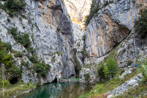 Majestic gorge of the Cares Trail with the river and steep cliffs in Picos de Europa