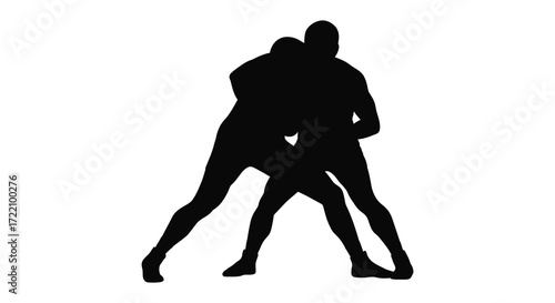Two silhouetted figures engaged in a grappling wrestling match