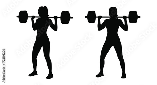 Silhouette of two women performing a barbell squat exercise indoors