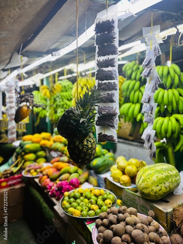 Banana and vegetable shops in Salalah, Oman, displaying fresh local produce during Khareef season, showcasing market culture, agriculture, food trade, and vibrant street life.