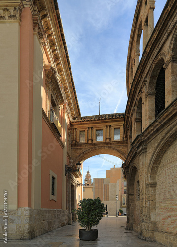 Narrow passage between Basilica of Our Lady de los Desamparados and Valencia Cathedral. City of Valencia, Spain