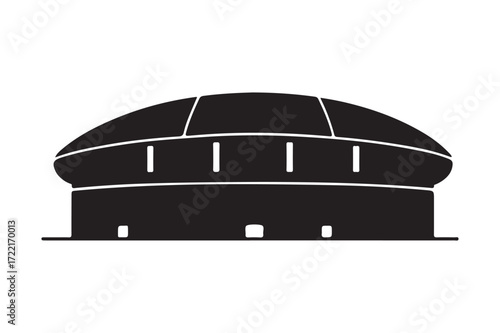 Silhouette of a large circular building with a domed roof