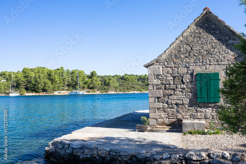 Stone Beach House By The Sea With Green Shutters On A Quiet Waterfront Cove, Necujam, Solta Island