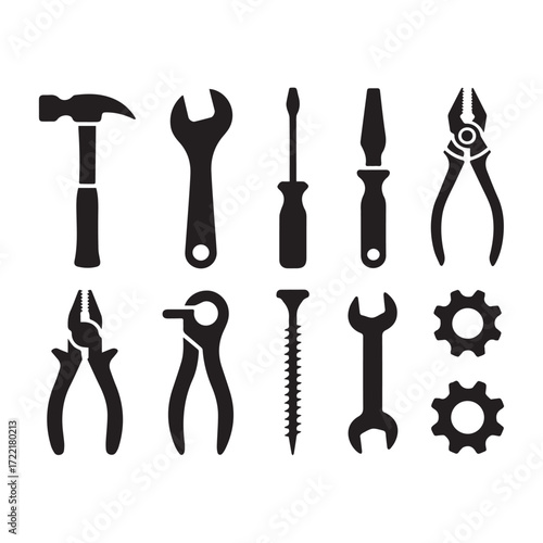 Collection of black silhouettes of tools and gears