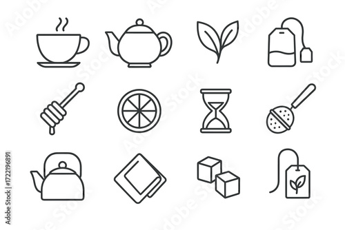 Tea essentials: teapot, cup, teabag, kettle, honey dipper, slice, leaves
