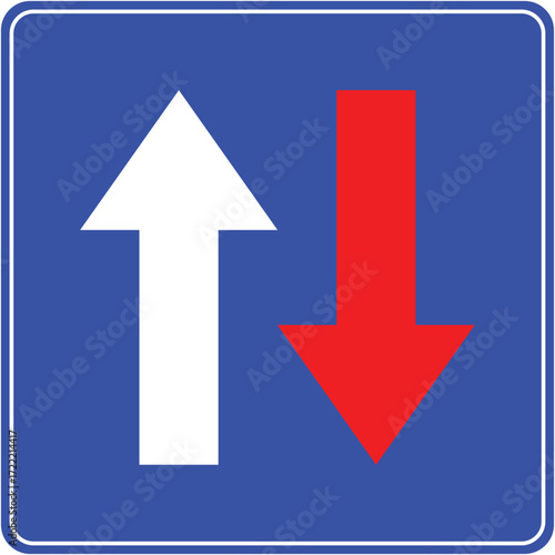 Give priority to oncoming traffic road sign with white and red arrows.