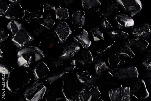 Black polished stones texture background