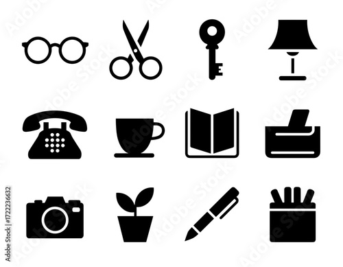 Collection of black silhouette vector icons depicting everyday objects: glasses, scissors, keys, lamps, phones, cups, books, printers, cameras, plants, pens, and a container with pencils.
