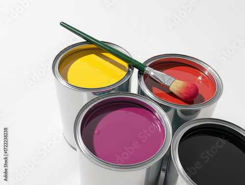 paints and brushes on white