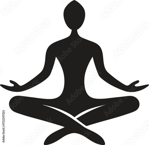 Silhouette of a person meditating in lotus position