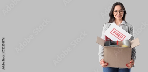 Happy fired businesswoman h...