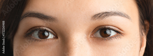 Young Asian woman with brow...