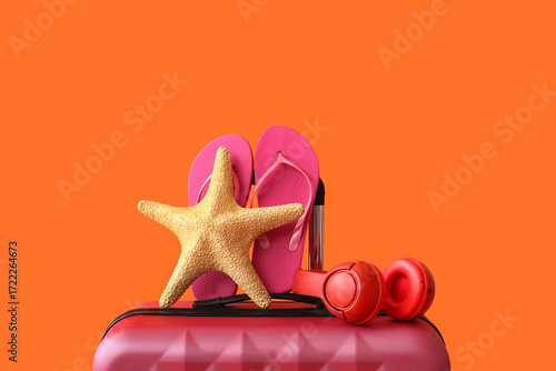Pink suitcase with starfish...