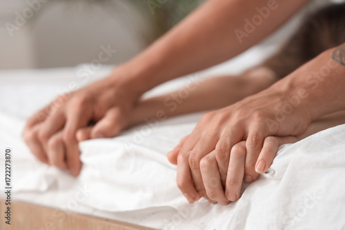 Cuadro en lienzo Young couple having sex on bed, closeup