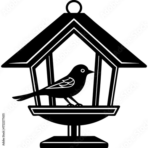 Stylized black silhouette of a bird perched on a bird feeder against a white background