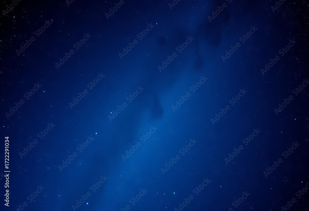 Fototapeta premium Vast, shimmering blue night sky filled with countless stars, gleam, deep