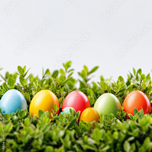 A variety of colorful Easter eggs scattered in a vibrant garden, ready for children to discover during an Easter egg hunt.