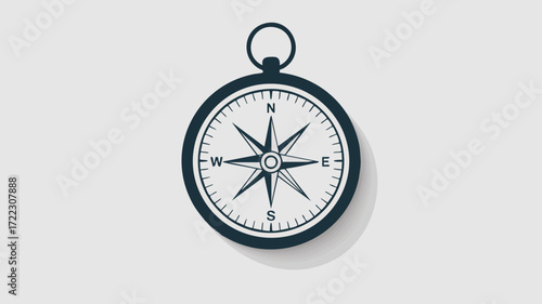 A classic navy blue compass with a detailed face showing cardinal directions and a hanging loop, casting a subtle shadow on a light grey background.