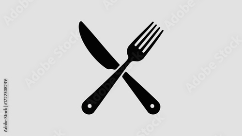 A black knife and fork crossed on a light grey background, symbolizing dining, a restaurant, or a meal.