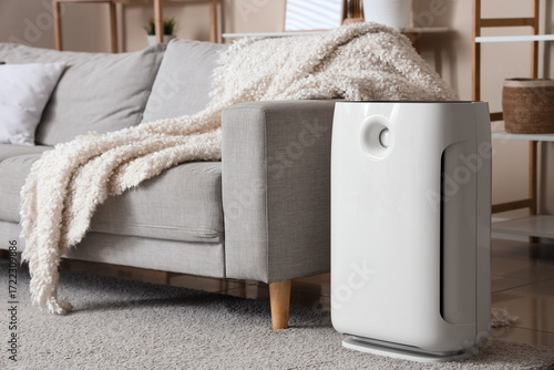 Modern air purifier near gr...