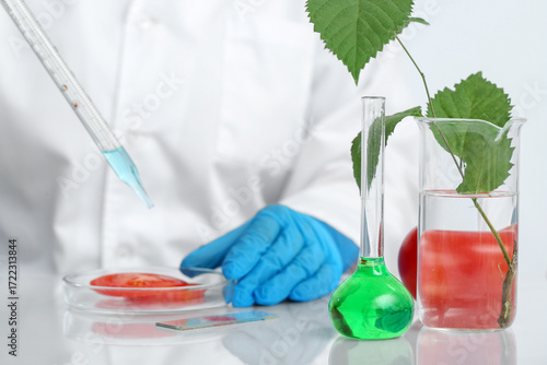 Female scientist with test ...