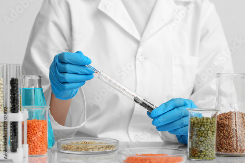 Female scientist with test ...