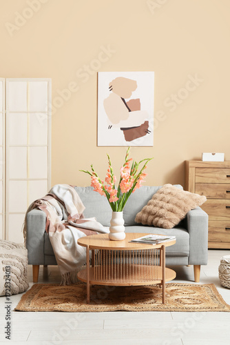 Sofa, table and vase with b...