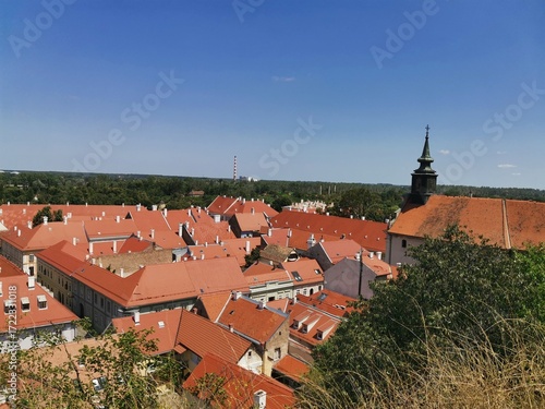Wallpaper Mural Historic cityscape with red rooftops and church tower Torontodigital.ca