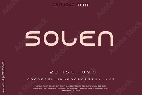 Modern sans serif font alphabet and numbers on dark background