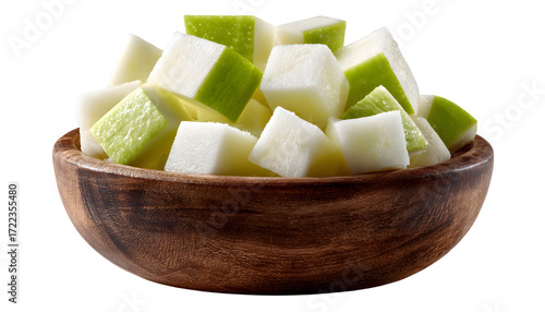 apple cubes freshly cut and piled in a wooden bowl ready for snacking or baking isolated on a white background