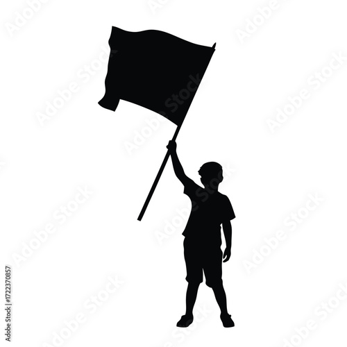 Silhouette of a child proudly waving a black flag outdoors